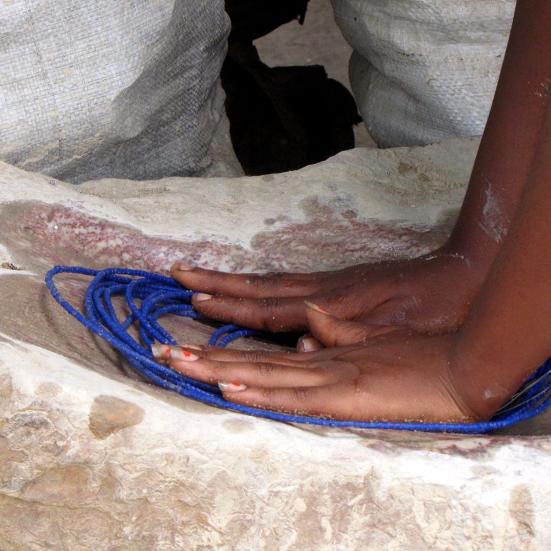 Salome polishing Ntaka glass beads